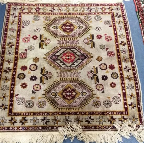 A small Caucasian rug 102 x 92cm